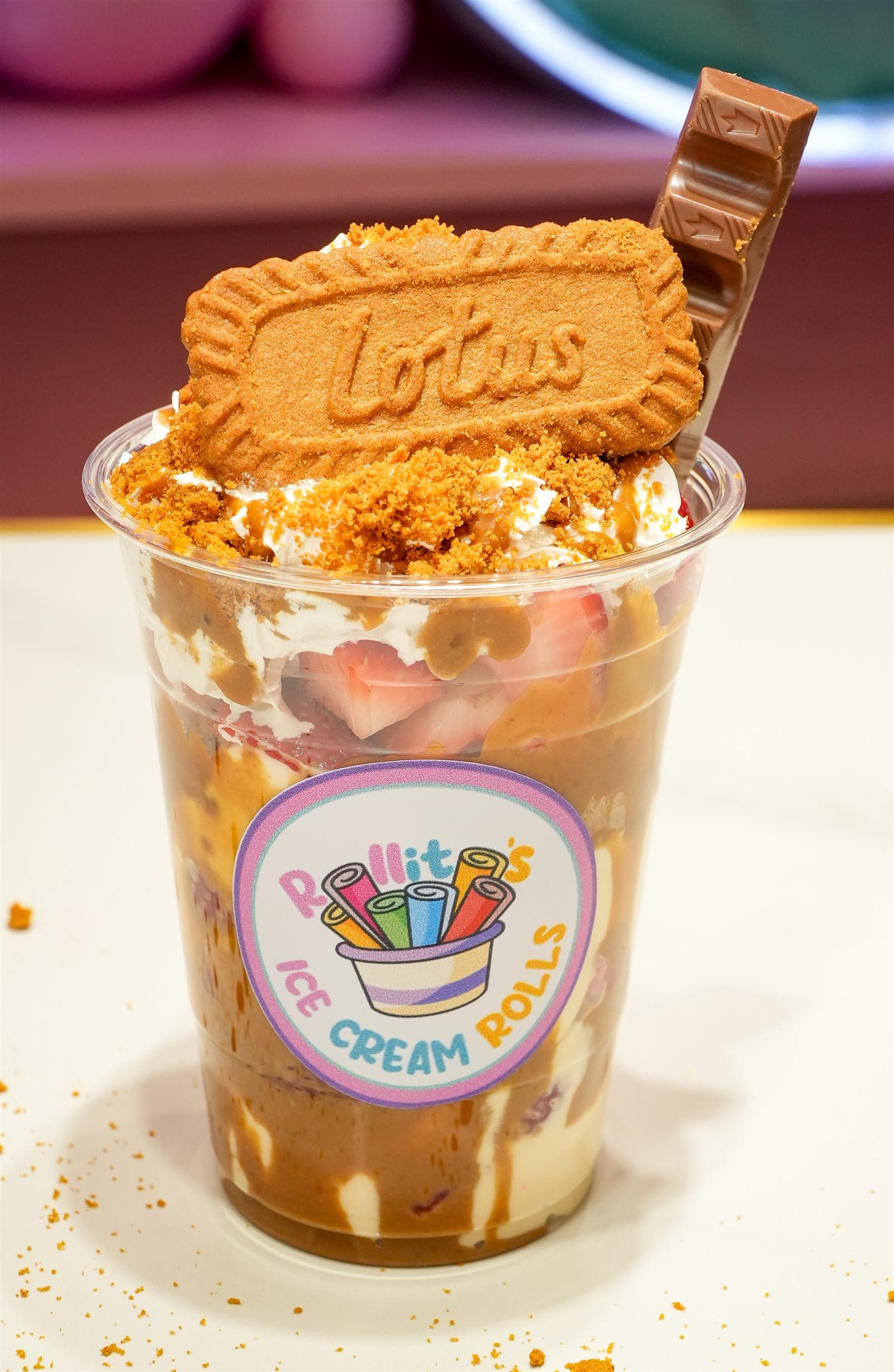 Biscoff sundae cup topped with a Lotus cookie and a chocolate bar
