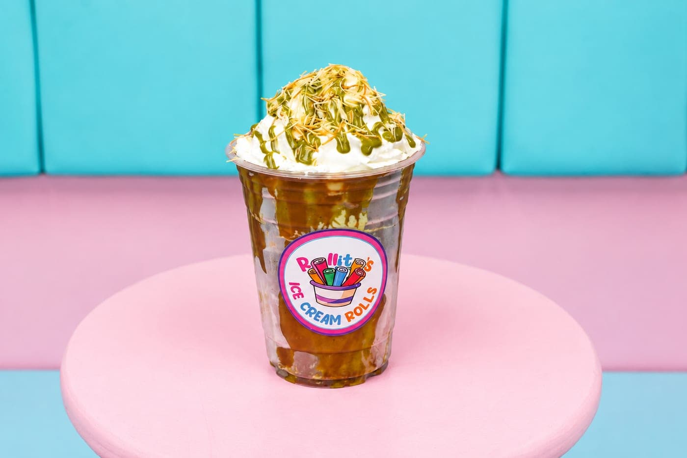 Pistachio milkshake with whipped cream and shredded kunafa on top