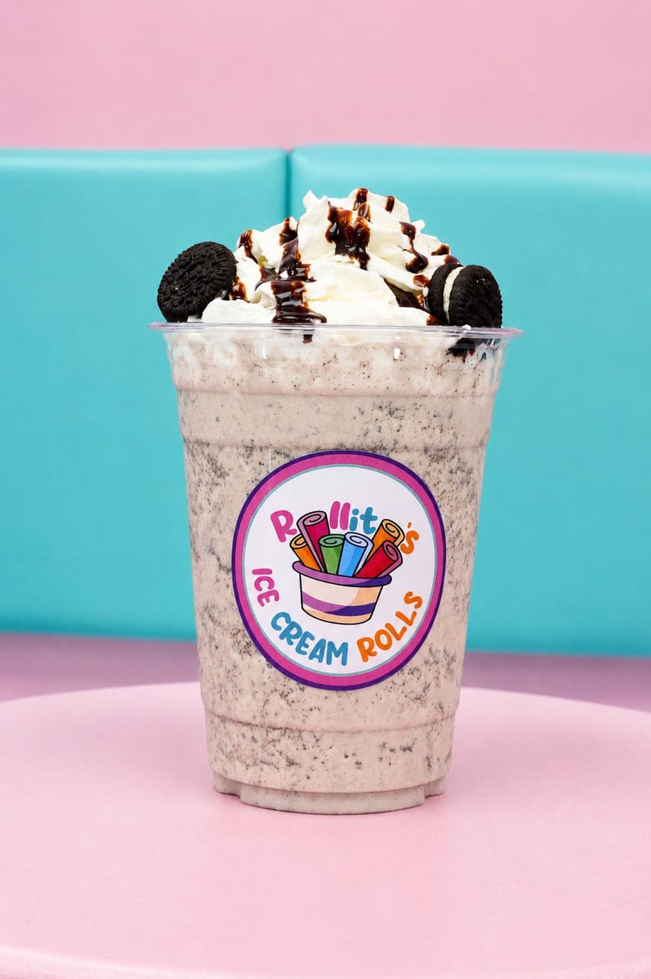 Cookies-and-cream milkshake with whipped cream, chocolate syrup, and Oreo cookies